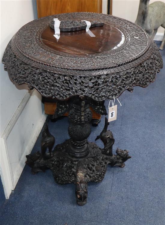 A 19th century Burmese carved circular table Diameter 66cm